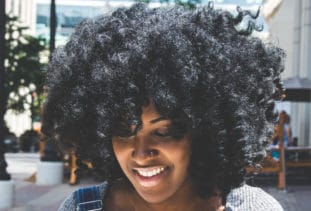 Black woman with thick, curly natural hair