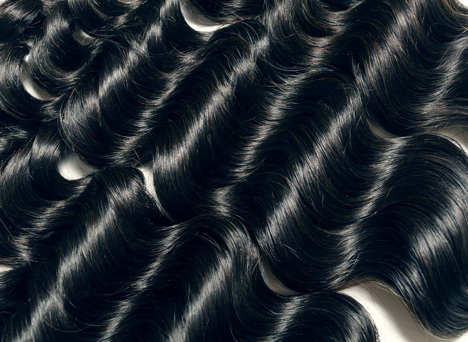 close up of weave hair laid out on table