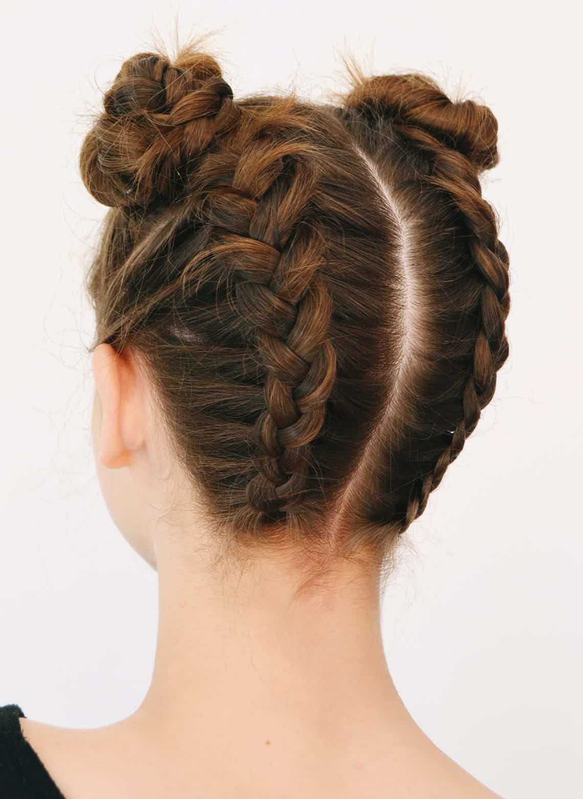 woman with braided space buns