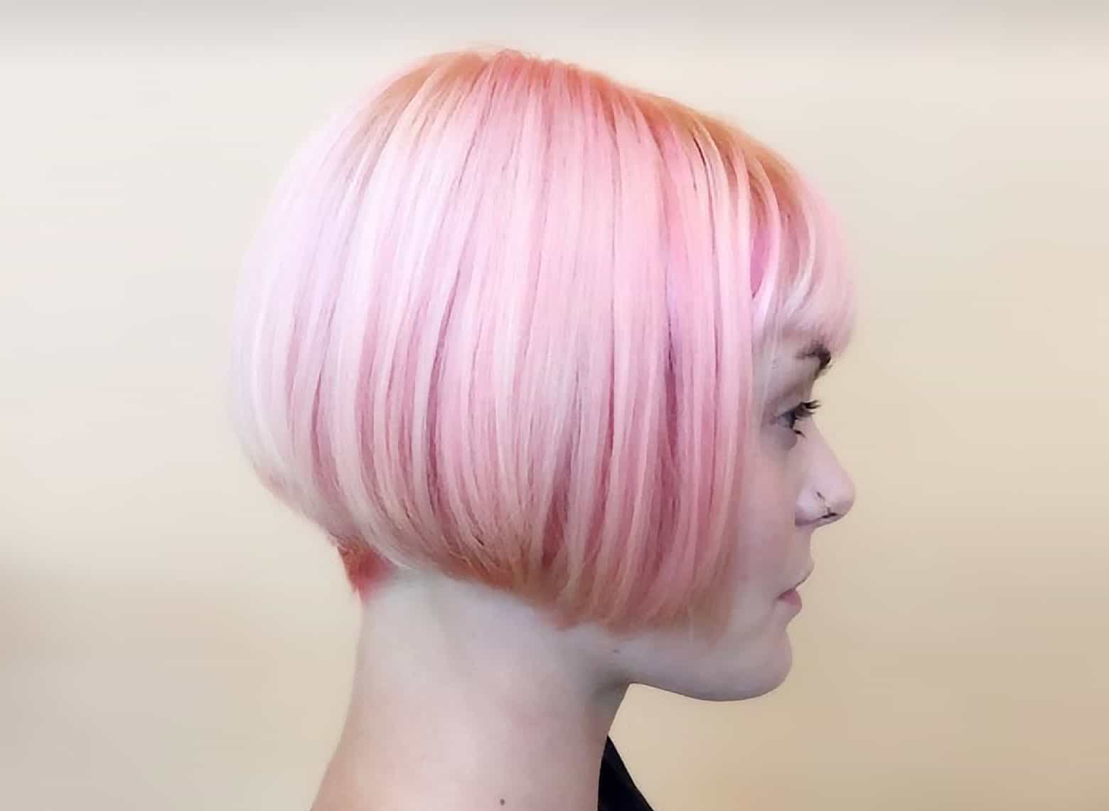 woman with straight bob and bold color