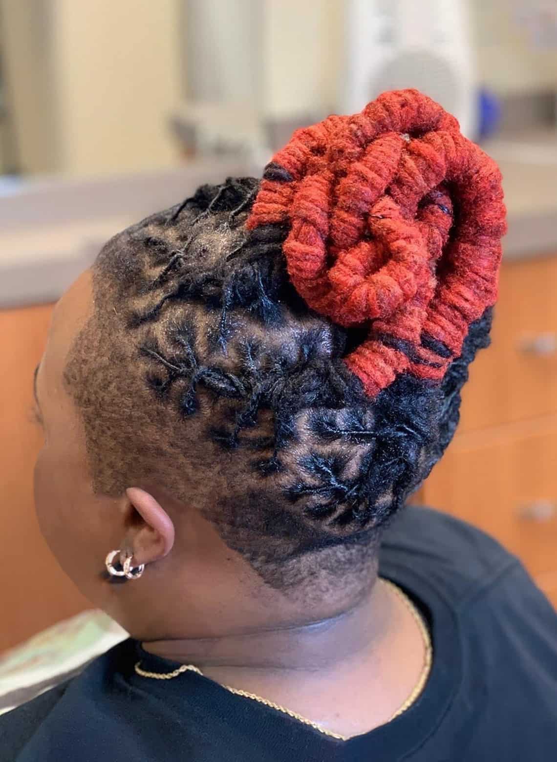 woman with boldly colored locs