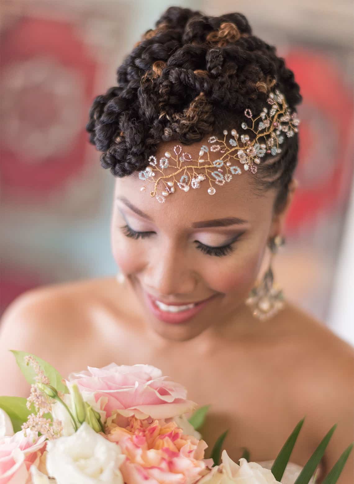 bride with braided updo and jeweled headband