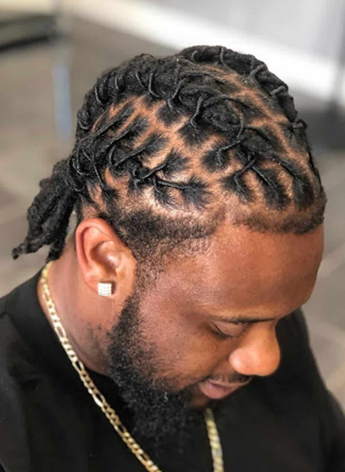 man with cornrows and dreads