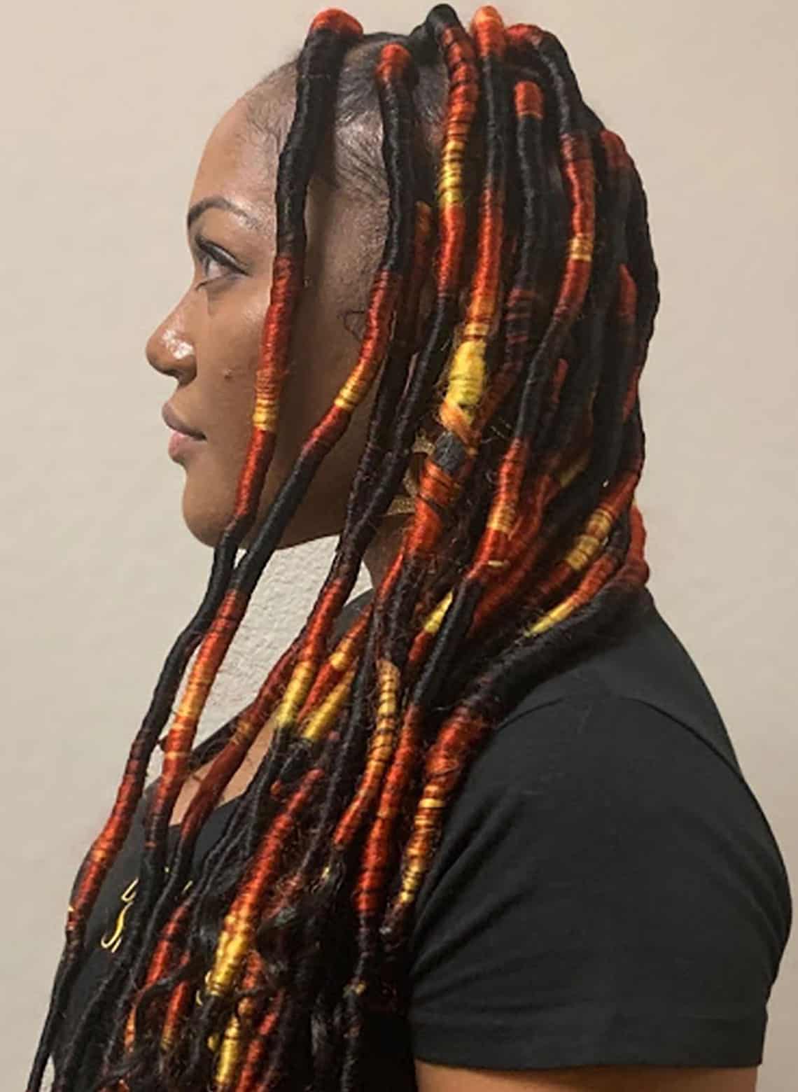 woman with dreads and colored thread
