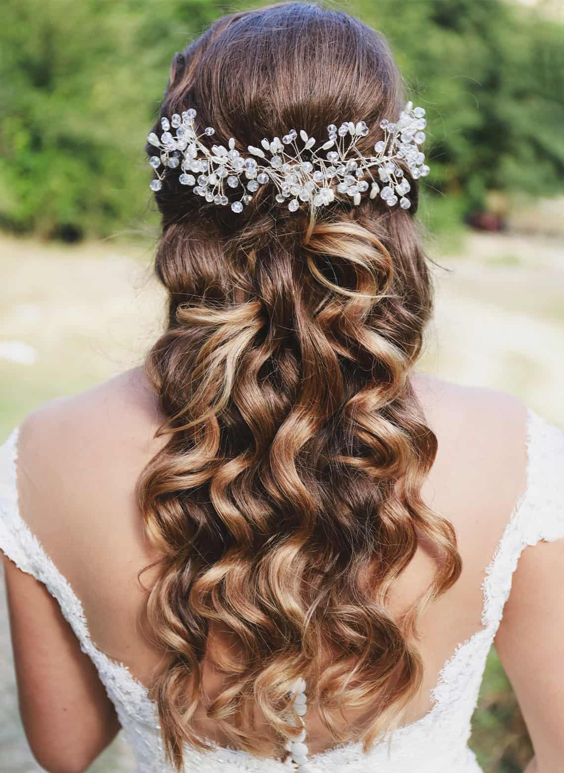 bride with half up half down curls