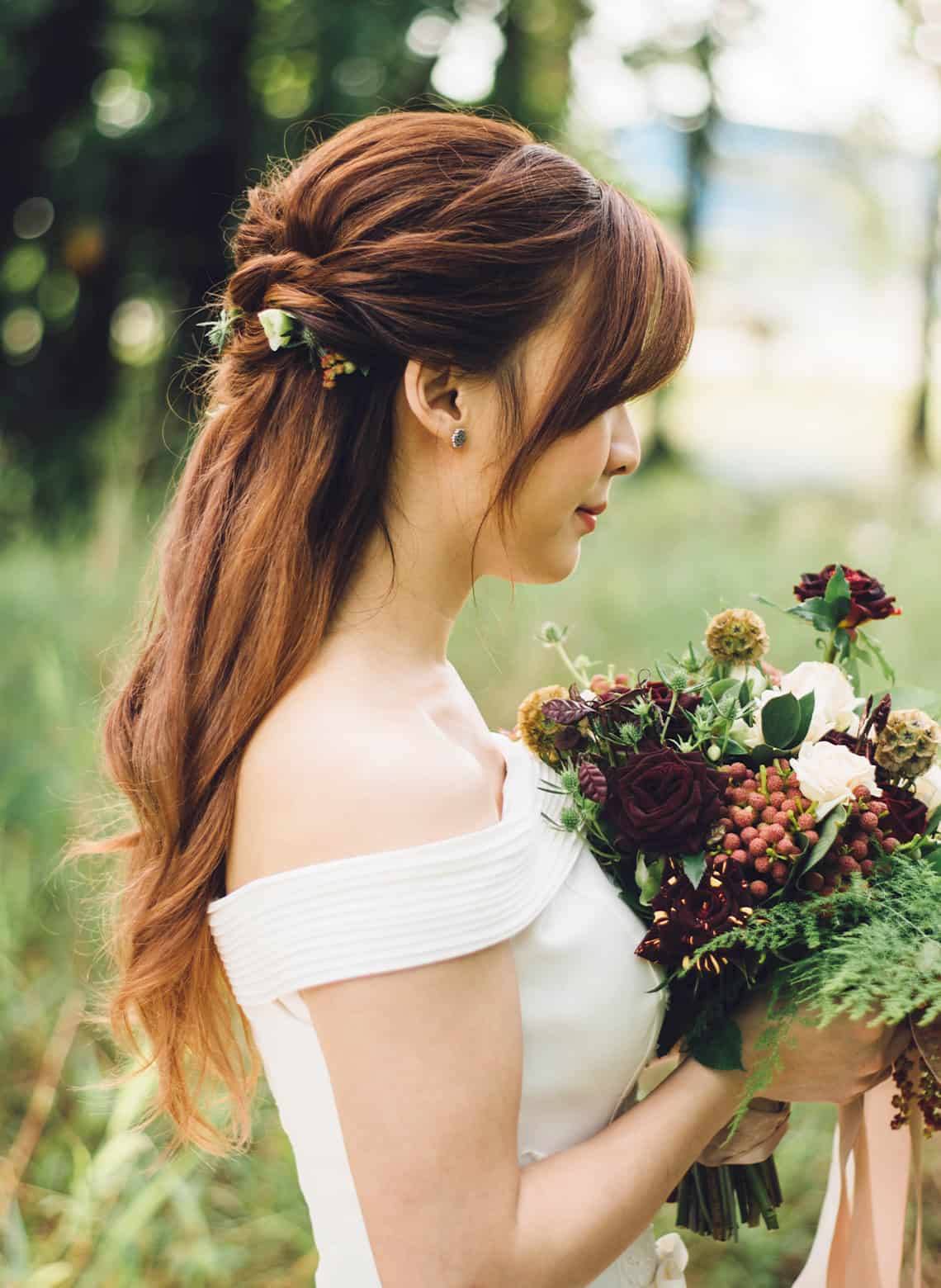 bride with half up half down hair with twists
