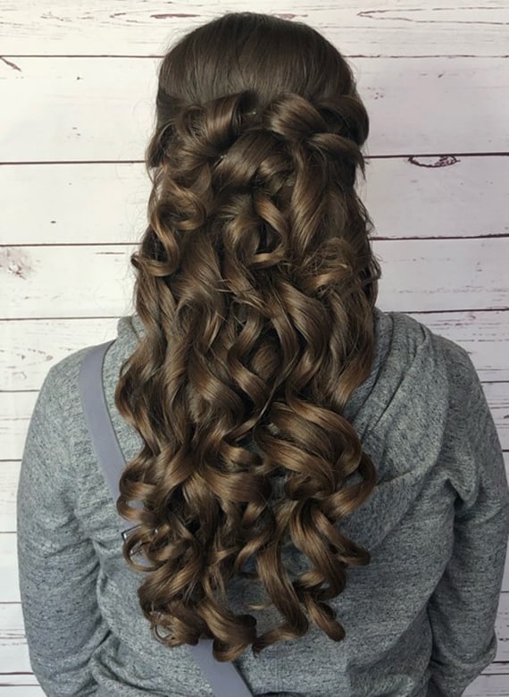 woman with half up half down curls