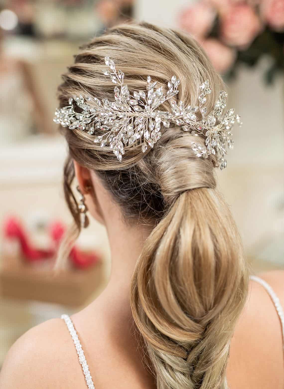 bride with low wrapped ponytail