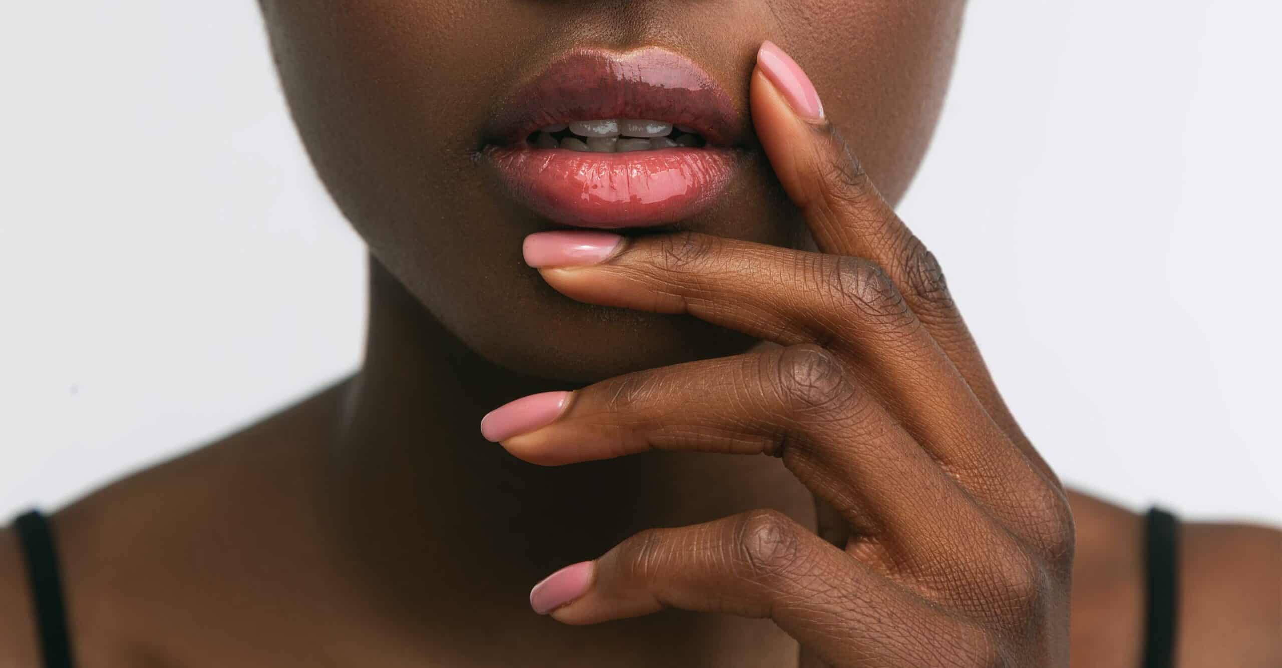 person showing lips and nails