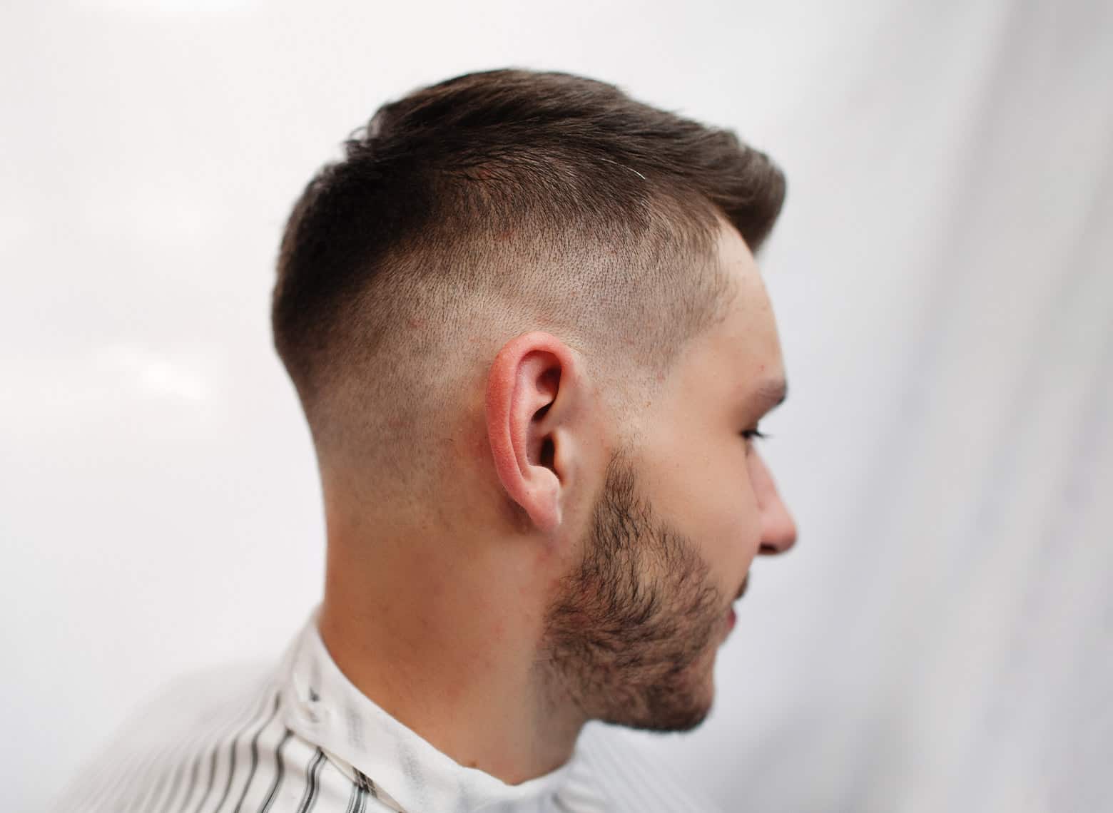 man with mid fade