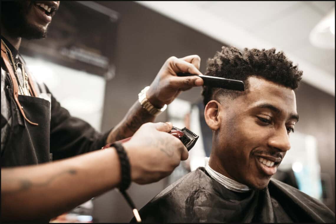 man getting hair cut