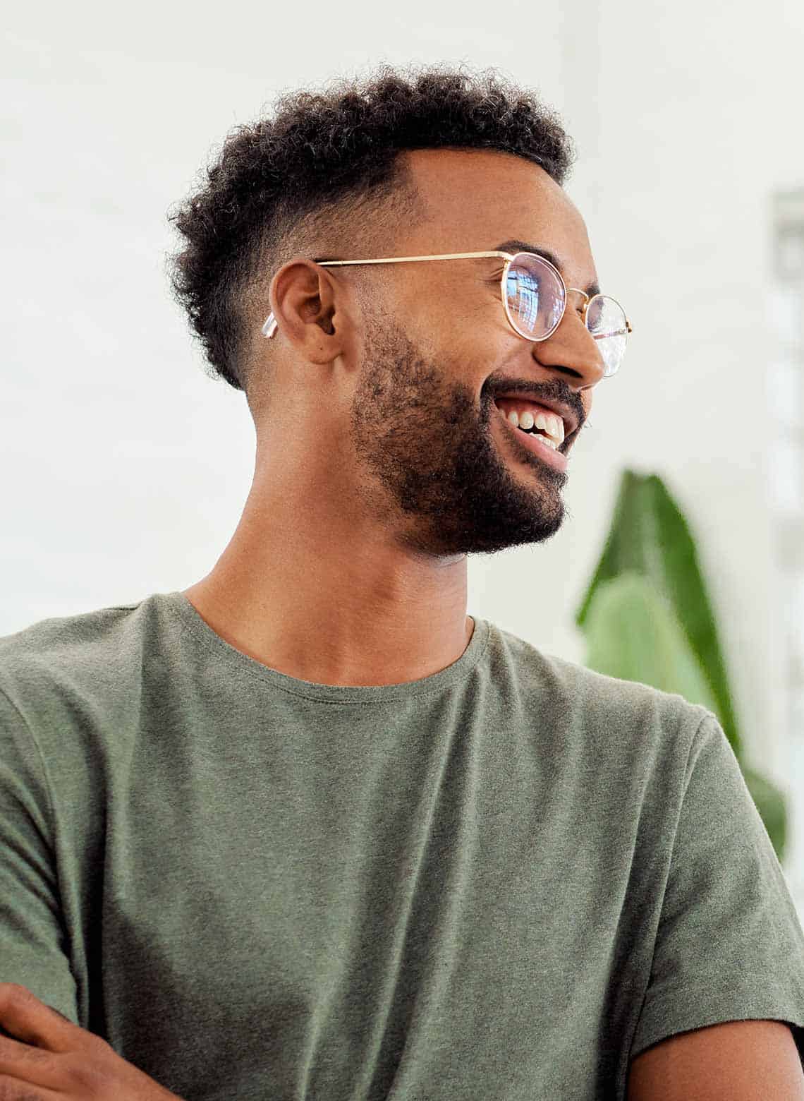 man with natural hair and a fade hairstyle