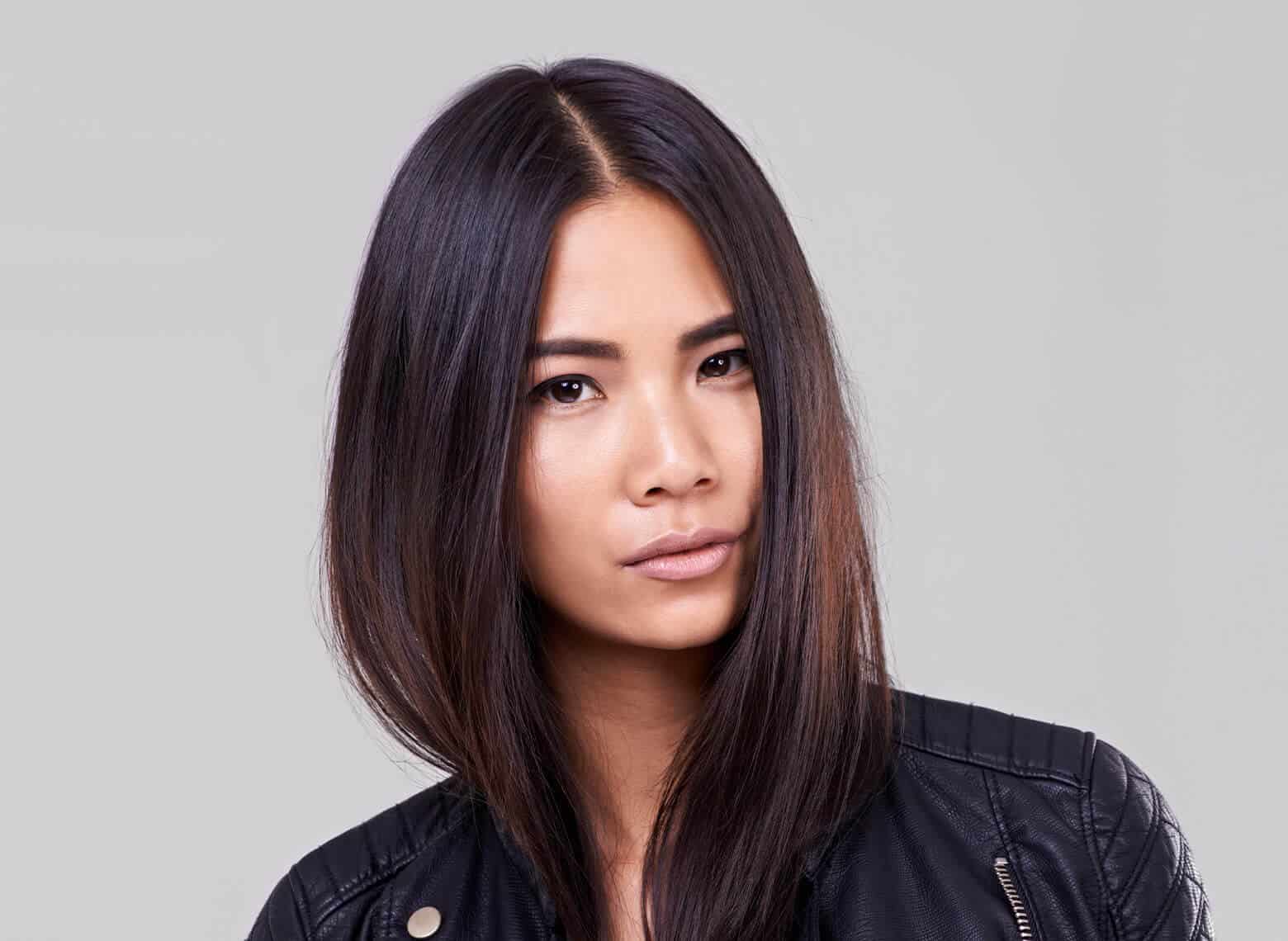 woman with a sleek middle part