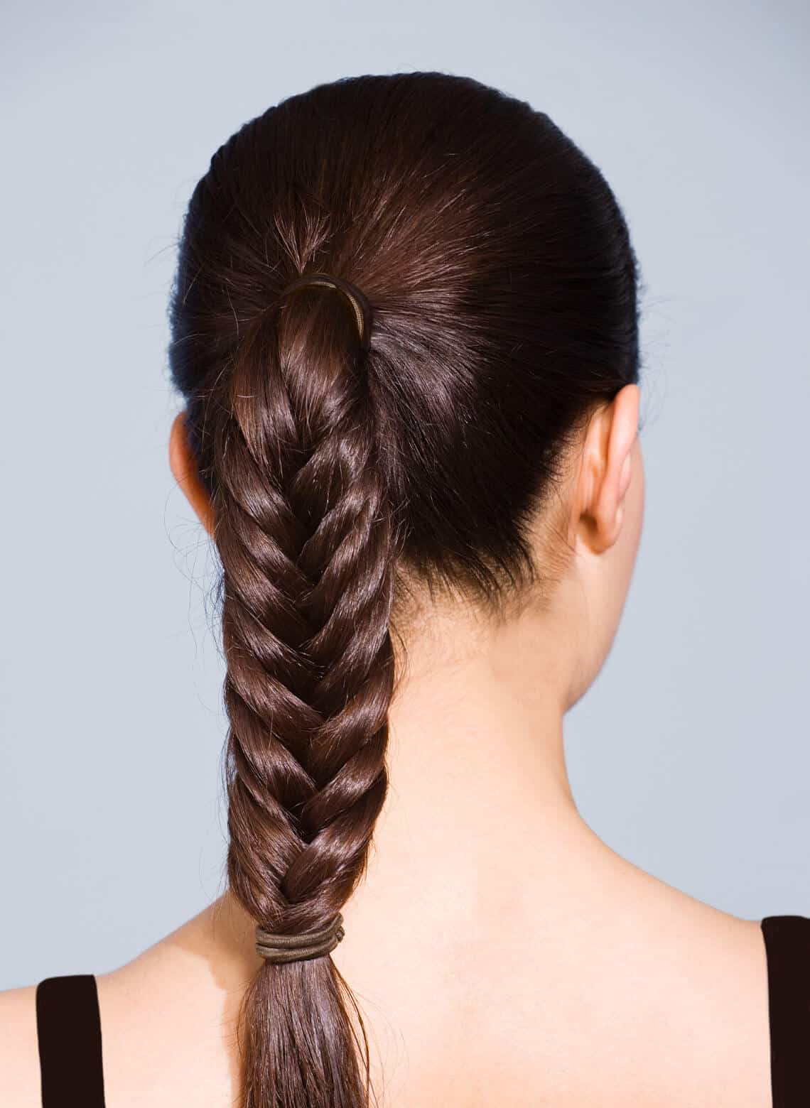 woman with braided ponytail