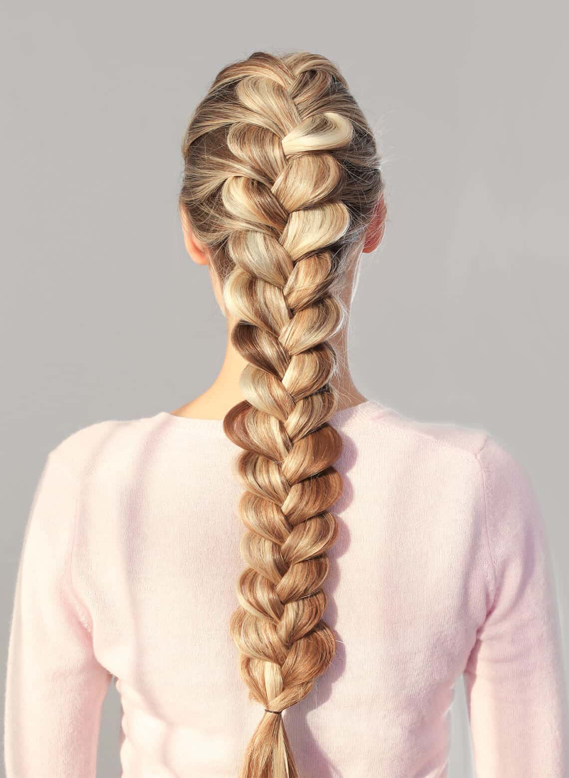 woman with a loose French braid