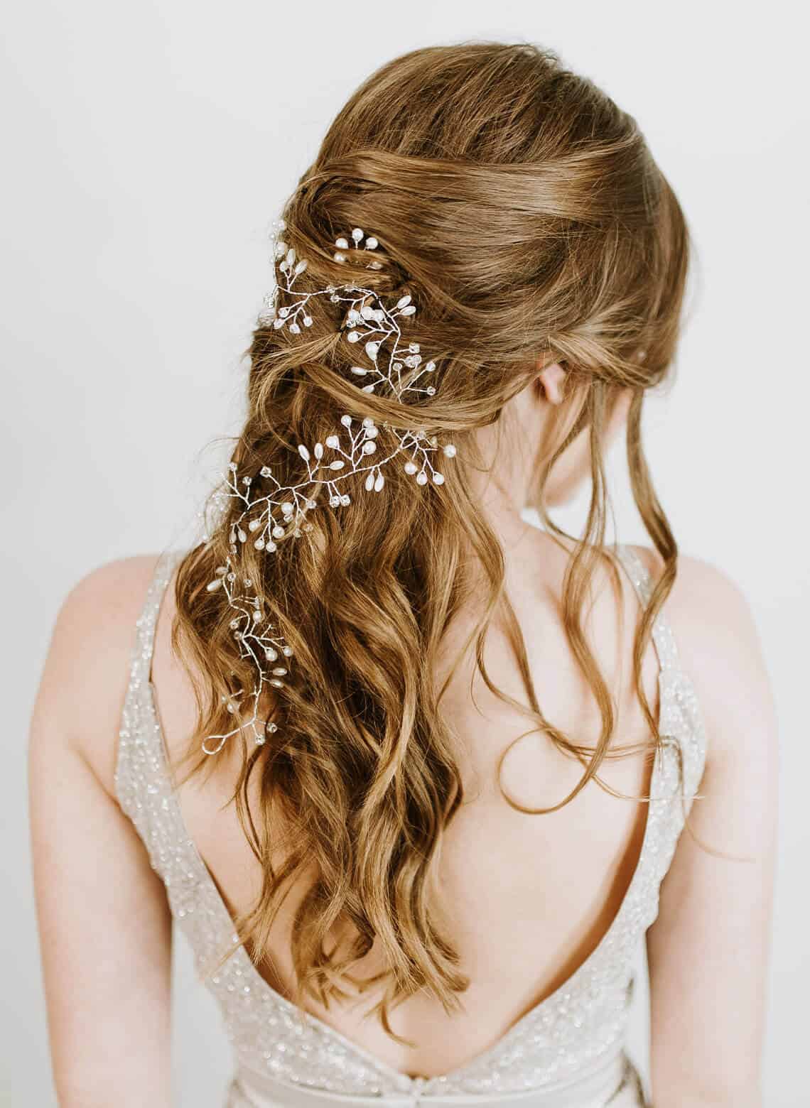 woman with wavy hair and accessories