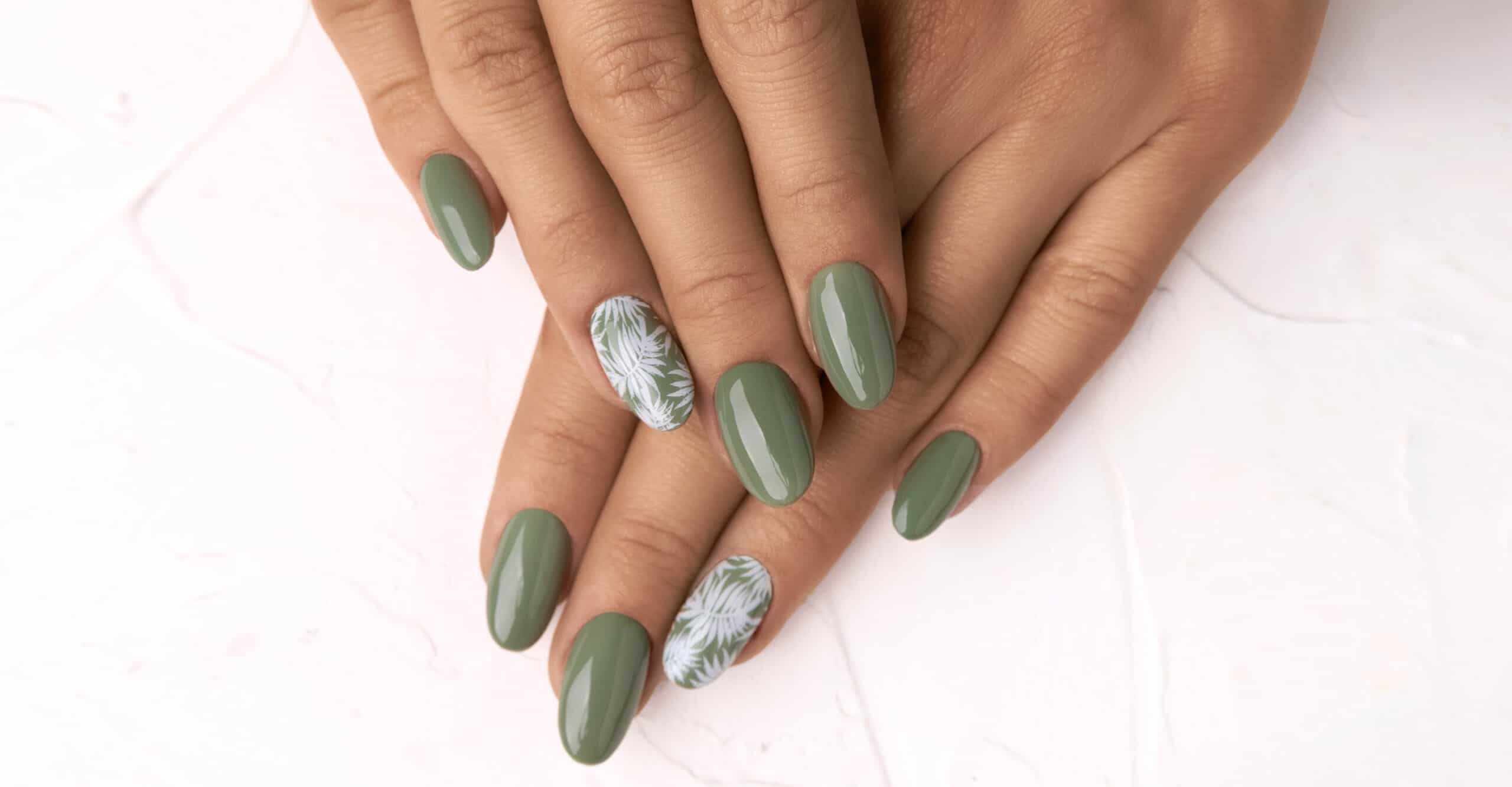 close up of green gel nails