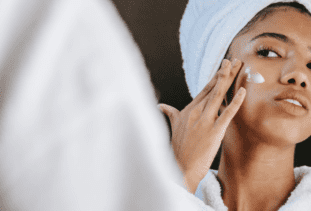 woman with spa towel and robe skincare