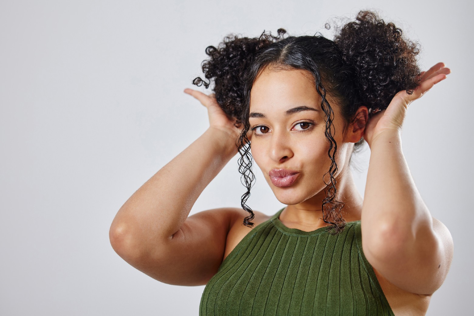 Woman with curly double puff hairstyle