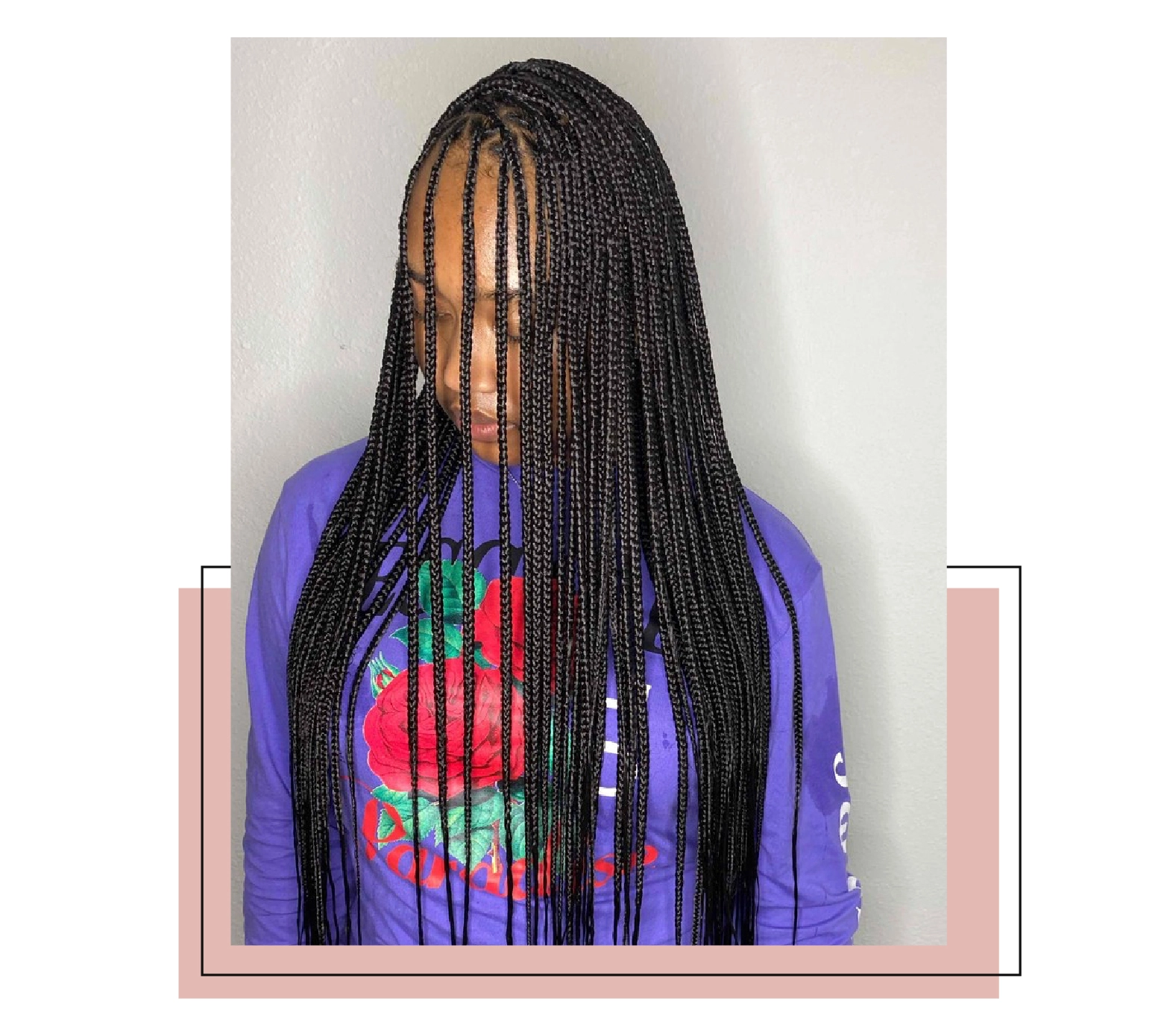 Woman with long knotless microbraids.