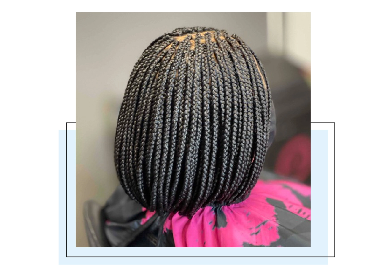 Woman with microbraids cut into a bob style.