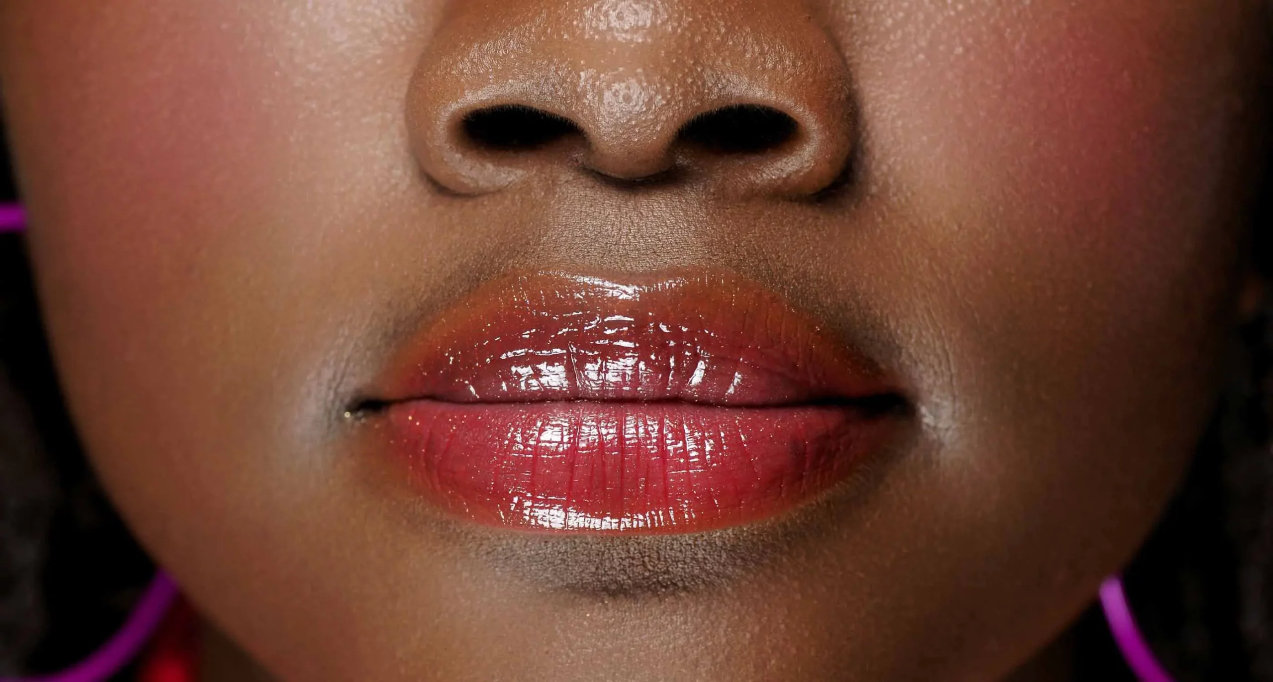 Close up of woman with lip blush.
