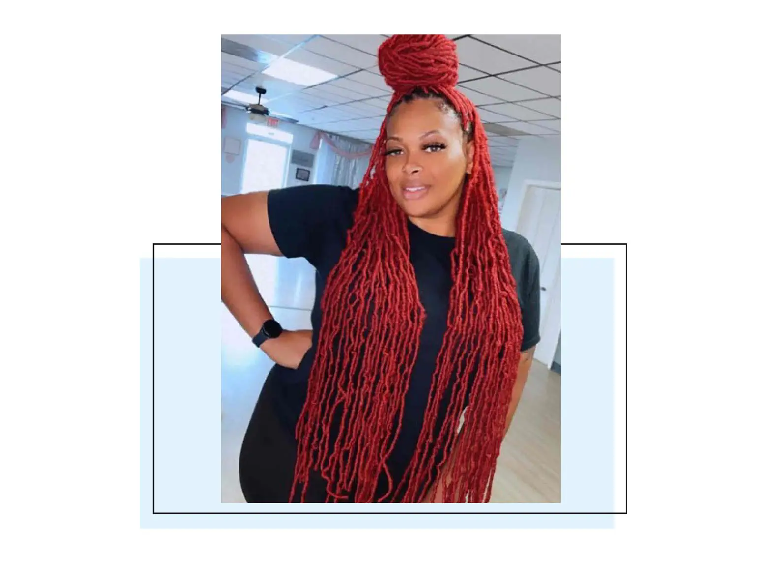 Woman with colorful red soft locs.