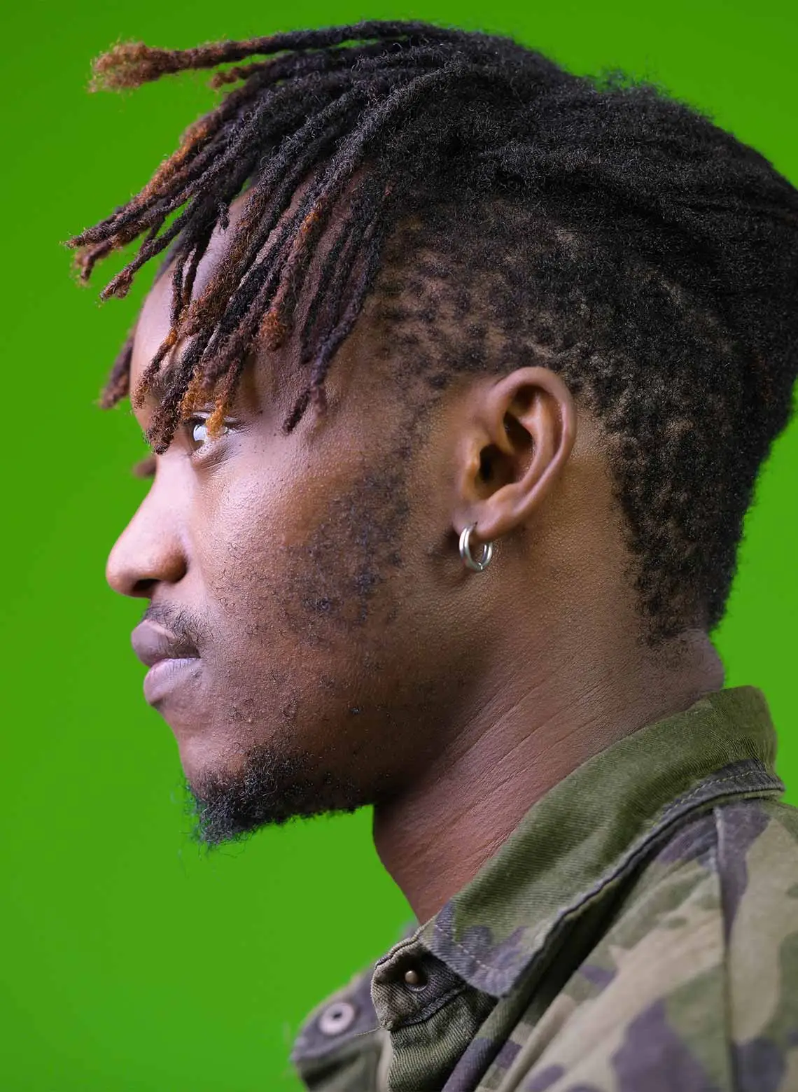 Image of man with ombre locs. 