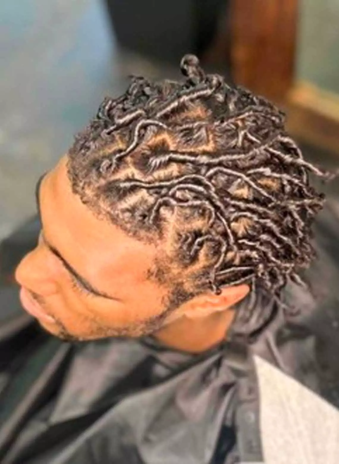 Image of man with comb twists. 