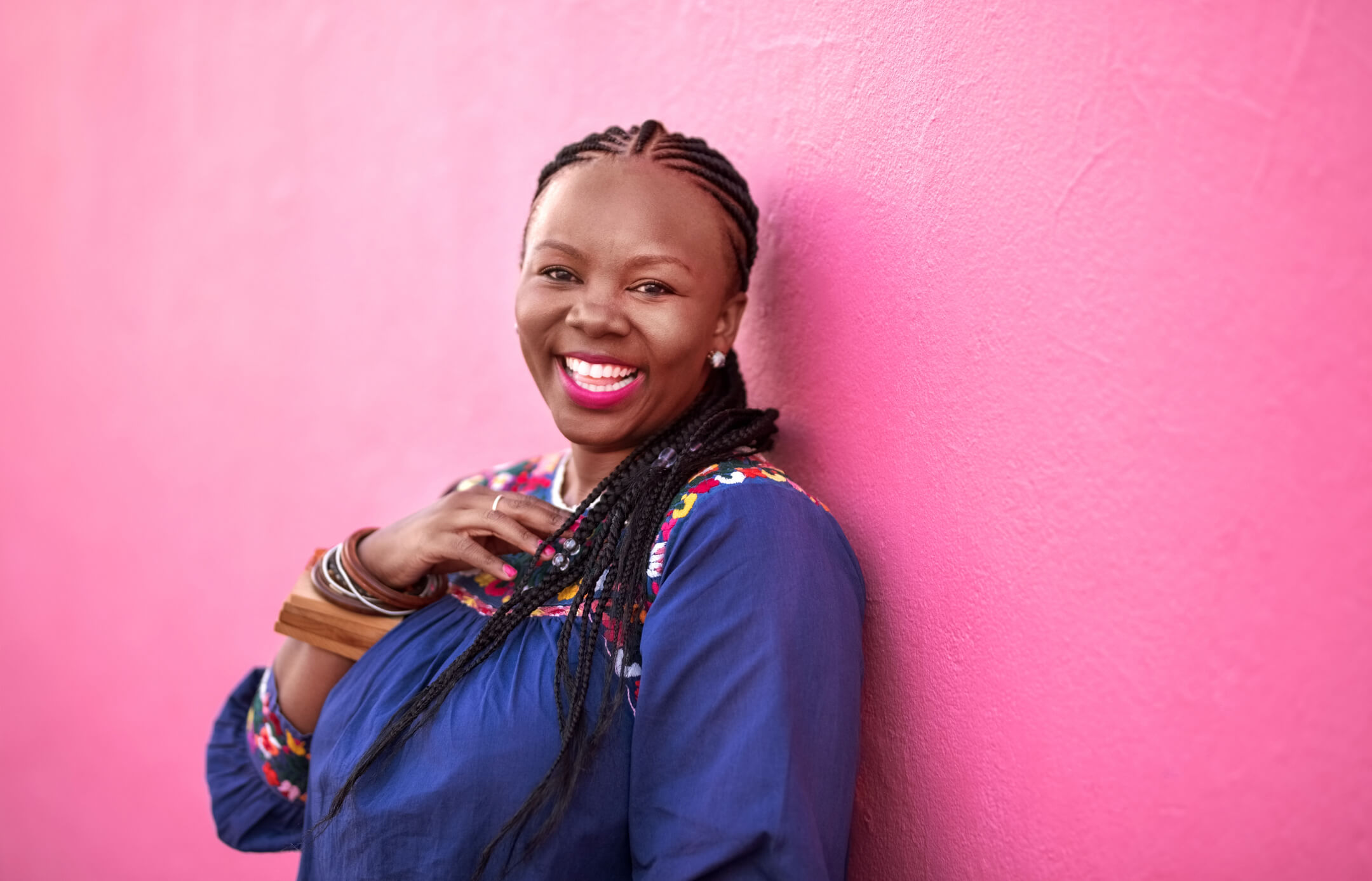 woman smiling with fulani braids